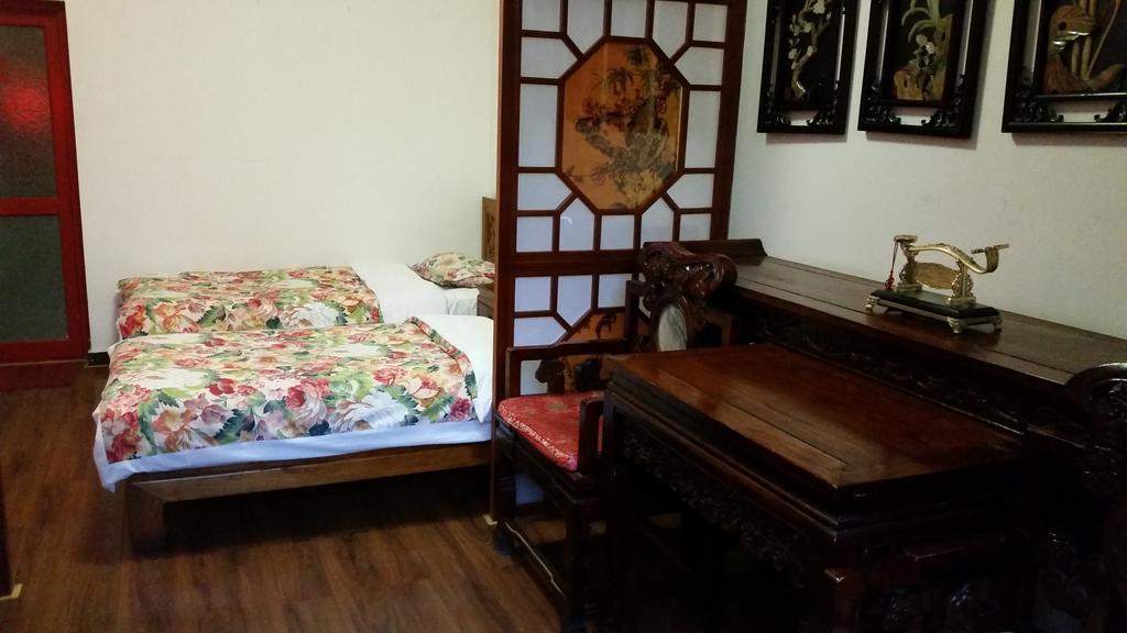 Tiananmen Best Year Courtyard Hotel Pekín Habitación foto